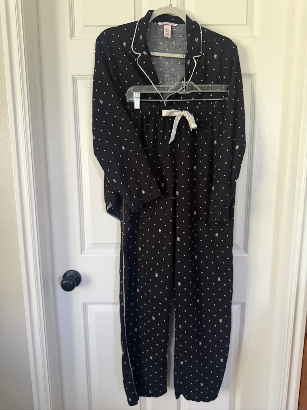 Victoria’s Secret pajama set in black with white polka dots and VS logo